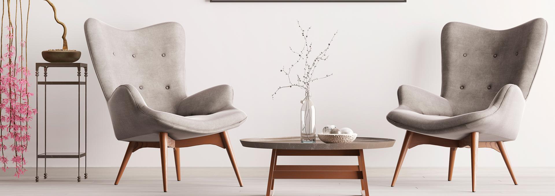 Minimalist lounge, twin chairs, wooden table.